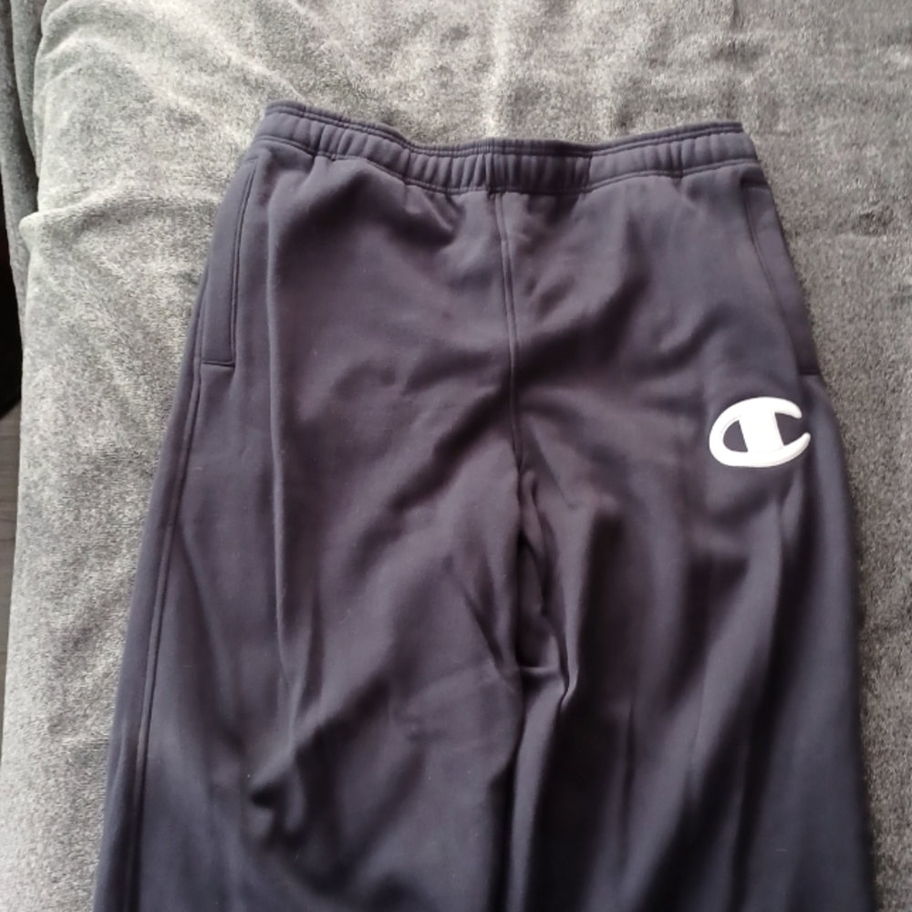 Men's Champion Navy blue Sweat Pants with button pockets.
